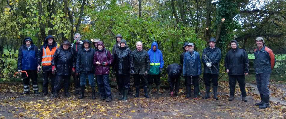 Group of volunteers in the rain